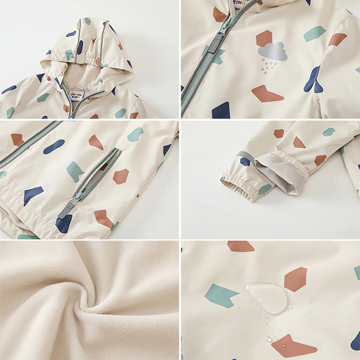 Detaljer av en beige regnset för barn med geometriskt mönster, jacka och byxor close-up