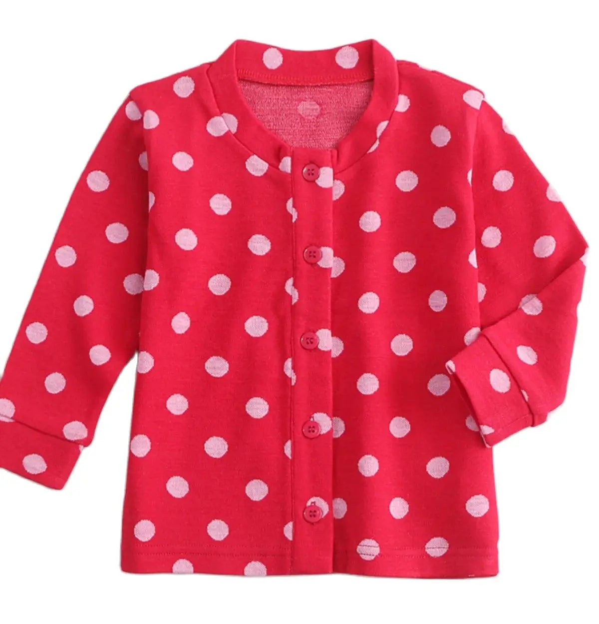 Röd prickig merino ull kofta för barn med knäppning och lång ärm mot en vit bakgrund