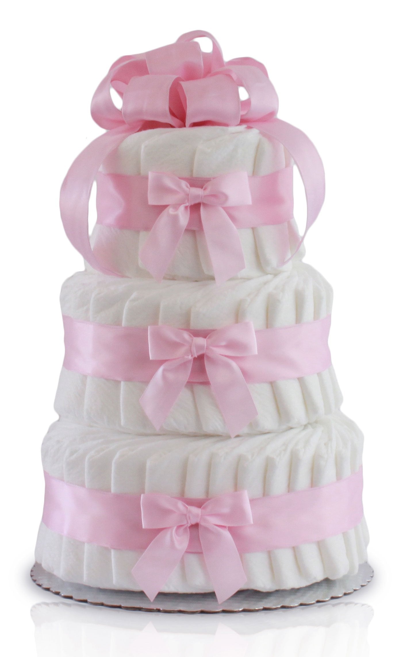 Vacker trevånings blöjtårta dekorerad med rosa band och rosetter för babyshowers och gender reveals