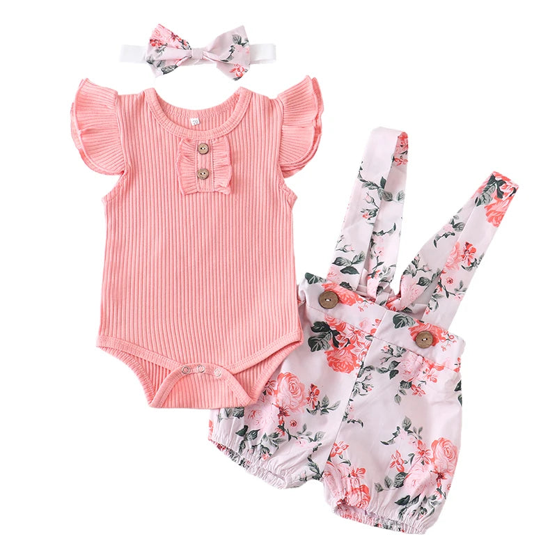 Rosa body med blommiga shorts och rosett hårband för babyflickor